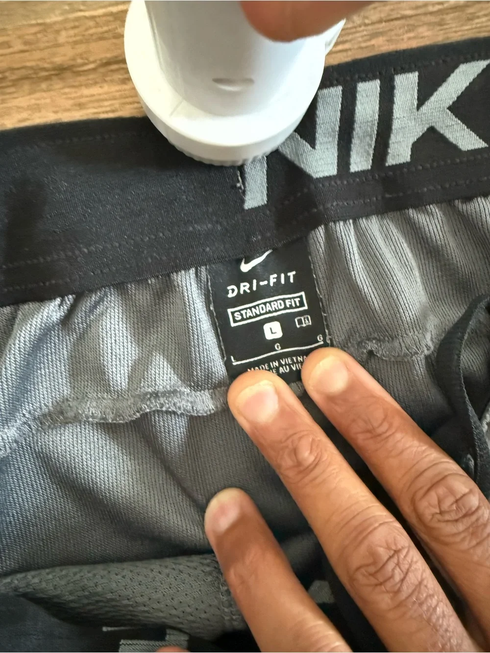 Nike Grey Performance Athletic Shorts with Subtle Swoosh Print